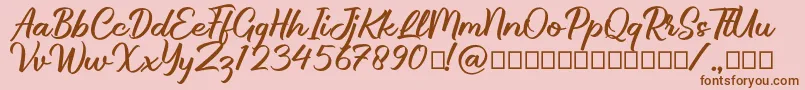 Brillotus-Schriftart – Braune Schriften auf rosa Hintergrund