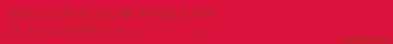 Czcionka brillyo  reguler – brązowe czcionki na czerwonym tle