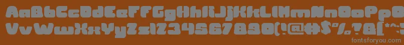 フォントBritish Pop Music – 茶色の背景に灰色の文字