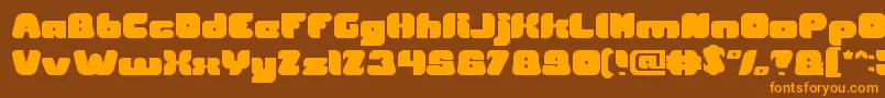 British Pop Music Font – Orange Fonts on Brown Background