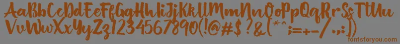 More about British Script Font British Script Font – Brown Fonts on Gray Background