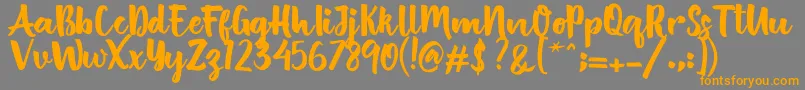 British Script Font – Orange Fonts on Gray Background