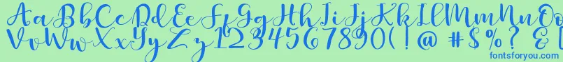 Britnees Font – Blue Fonts on Green Background