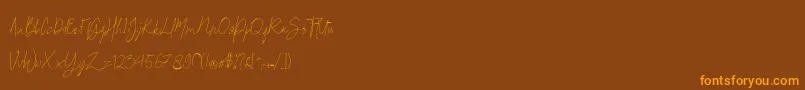 Britson Font – Orange Fonts on Brown Background