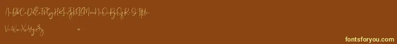 Brittaney free Font – Yellow Fonts on Brown Background