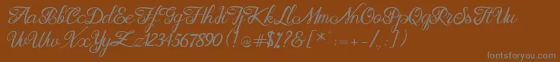 Brittania Modern Calligraphy Demo Font – Gray Fonts on Brown Background