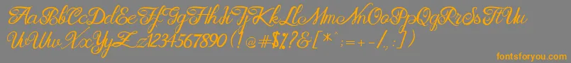 Brittania Modern Calligraphy Demo Font – Orange Fonts on Gray Background