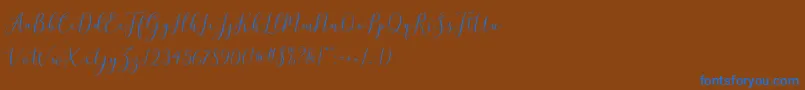 brittania script demo Font – Blue Fonts on Brown Background