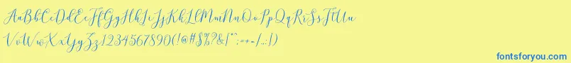 brittania script demo Font – Blue Fonts on Yellow Background