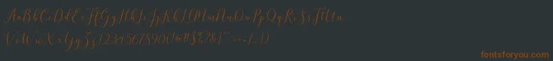 brittania script demo Font – Brown Fonts on Black Background