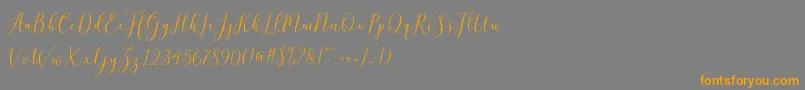 brittania script demo Font – Orange Fonts on Gray Background