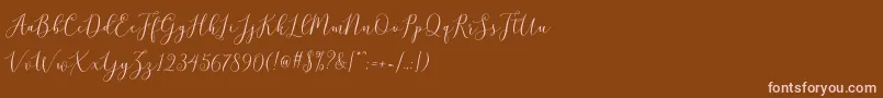 フォントbrittania script demo – 茶色の背景にピンクのフォント