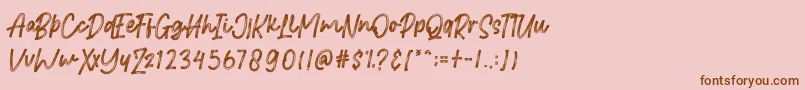 Brittanian Font – Brown Fonts on Pink Background