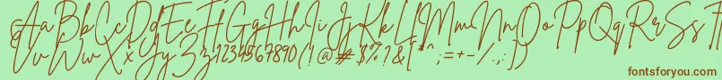 BrittanySignature-Schriftart – Braune Schriften auf grünem Hintergrund