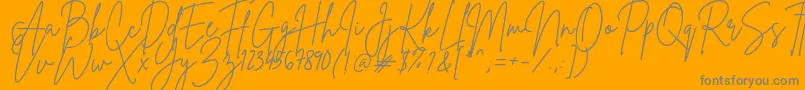 Więcej informacji o czcionce BrittanySignature Czcionka BrittanySignature – szare czcionki na pomarańczowym tle