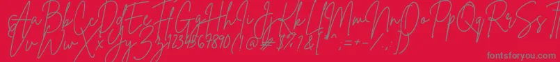 Fonte BrittanySignature – fontes cinzas em um fundo vermelho