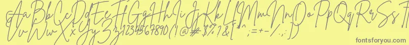 フォントBrittanySignature – 黄色の背景に灰色の文字