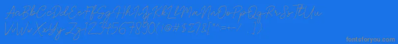 Brittney Signature-Schriftart – Graue Schriften auf blauem Hintergrund