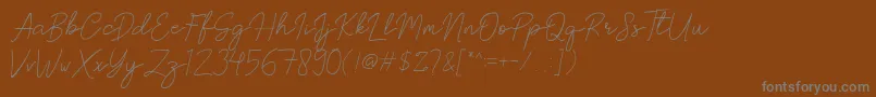 Brittney Signature-Schriftart – Graue Schriften auf braunem Hintergrund