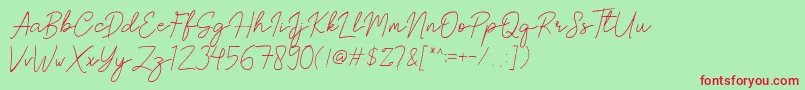 フォントBrittney Signature – 赤い文字の緑の背景