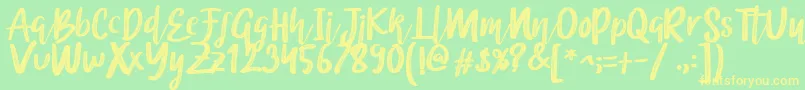 Brittney Font – Yellow Fonts on Green Background