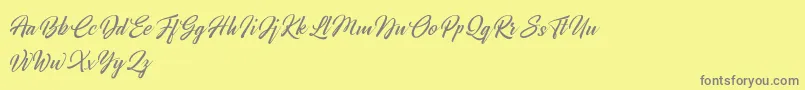 Broda   Dafont-Schriftart – Graue Schriften auf gelbem Hintergrund