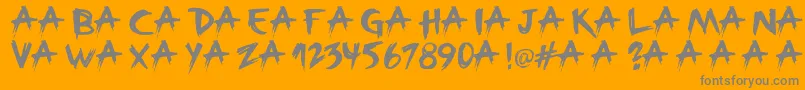フォントBroken – オレンジの背景に灰色の文字
