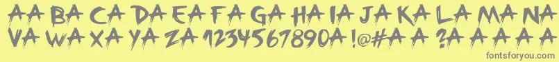 フォントBroken – 黄色の背景に灰色の文字