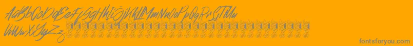 Broklight-Schriftart – Graue Schriften auf orangefarbenem Hintergrund