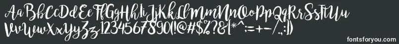bromello Regular Font – White Fonts on Black Background