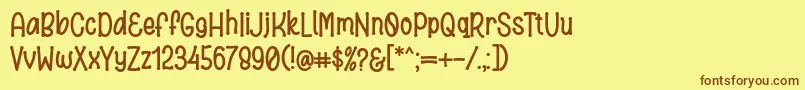 Bronice Font Regular by 7NTypes Font – Brown Fonts on Yellow Background