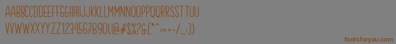 フォントBrook Demo – 茶色の文字が灰色の背景にあります。