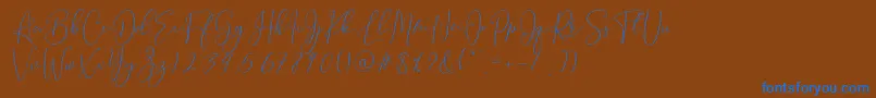 Brooke Smith Script-Schriftart – Blaue Schriften auf braunem Hintergrund