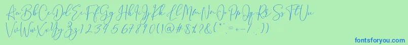 フォントBrooke Smith Script – 青い文字は緑の背景です。