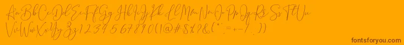 フォントBrooke Smith Script – オレンジの背景に茶色のフォント