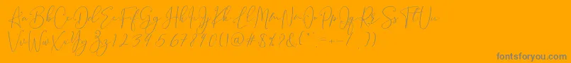 Brooke Smith Script-Schriftart – Graue Schriften auf orangefarbenem Hintergrund