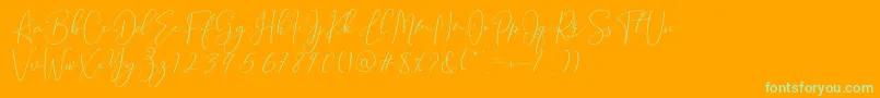 Brooke Smith Script-fontti – vihreät fontit oranssilla taustalla