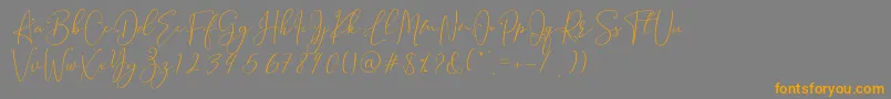 Brooke Smith Script Font – Orange Fonts on Gray Background