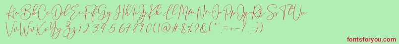 Brooke Smith Script-Schriftart – Rote Schriften auf grünem Hintergrund