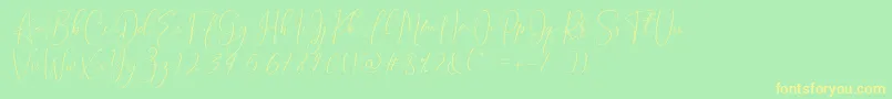 フォントBrooke Smith Script – 黄色の文字が緑の背景にあります