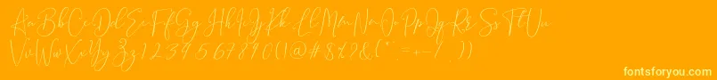 Brooke Smith Script Font – Yellow Fonts on Orange Background