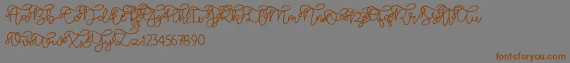 Brooklyn script-Schriftart – Braune Schriften auf grauem Hintergrund
