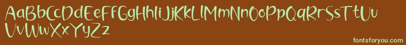 Шрифт brush kencur demo – зелёные шрифты на коричневом фоне