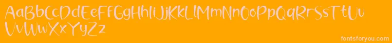 brush kencur demo Font – Pink Fonts on Orange Background