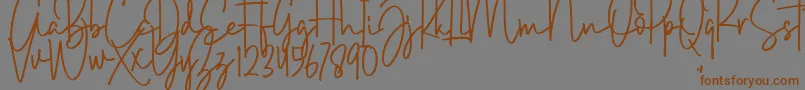Weitere Informationen zur Brush Wayne-Schriftart Brush Wayne-Schriftart – Braune Schriften auf grauem Hintergrund