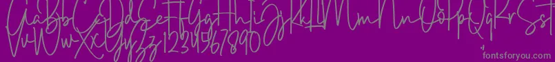 Brush Wayne-fontti – harmaat kirjasimet violetilla taustalla