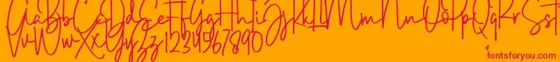 フォントBrush Wayne – オレンジの背景に赤い文字