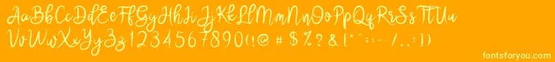 brushnyoe Font – Yellow Fonts on Orange Background