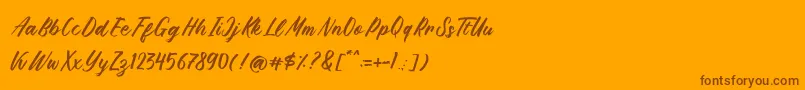 Więcej informacji o czcionce Brushpen Story Czcionka Brushpen Story – brązowe czcionki na pomarańczowym tle