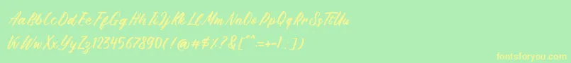 Brushpen Story Font – Yellow Fonts on Green Background